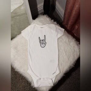 Gerber Cream Baby Onesie with Skeleton Hand Design